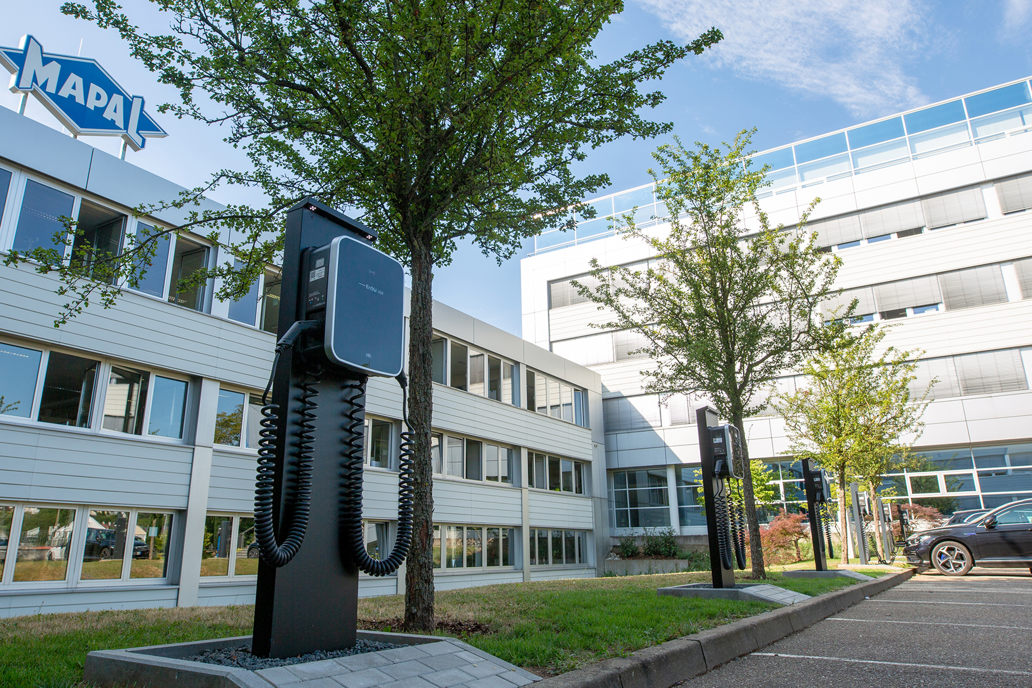 Parking spaces with charging points for e-cars in front of the main entrance at the Aalen site. 